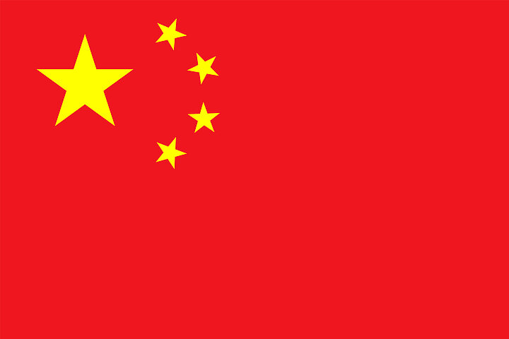 Red flag with a group of four small yelow stars and one big on the left.